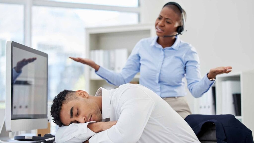 An image showing a manager dealign with a difficult employee at work