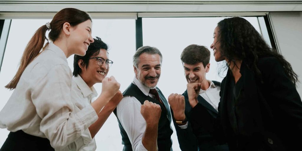 An image showing a manager empowering his team with effective Management Skills